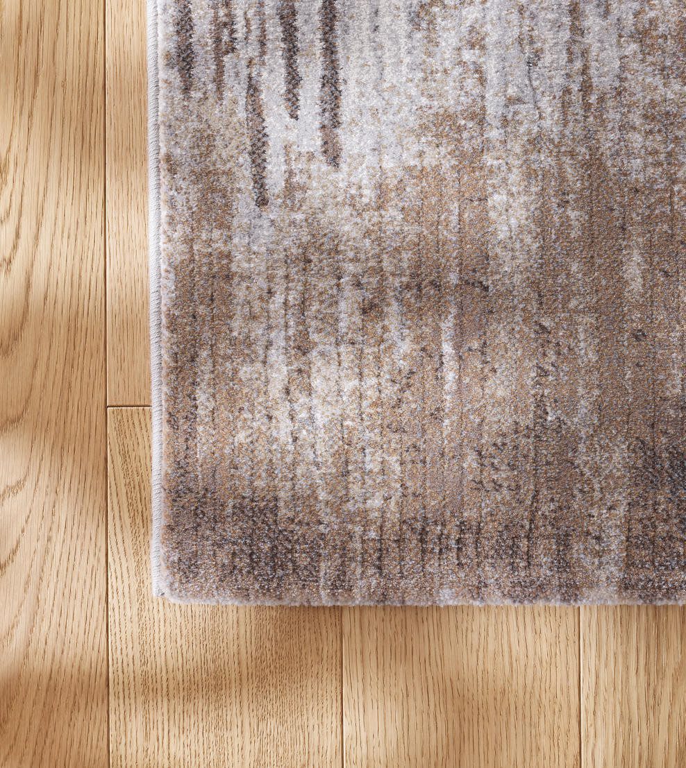 Tepih GENT ROSA svijetli moderni tepih u bež, krem, sivkastim i blago roskastim tonovima s apstraktnim teksturiranim uzorkom, izrađen od 100% PP Heatset materijala.