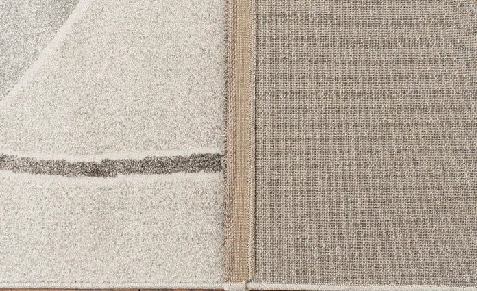 Tepih PICASO moderni sivo bež tepih s geometrijskim zaobljenim uzorkom, mekanom teksturom i profinjenom visoko niskom površinom.
